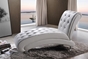 Baxton Studio Pease Contemporary White Faux Leather Upholstered Crystal Button Tufted Chaise Lounge - BSOBBT5187-White-Chaise