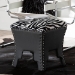 Baxton Studio Sally Modern and Contemporary Zebra-print Patterned Fabric Brown Faux Leather Upholstered Accent Stool with Nail heads - BSOWS-B1212-Brown